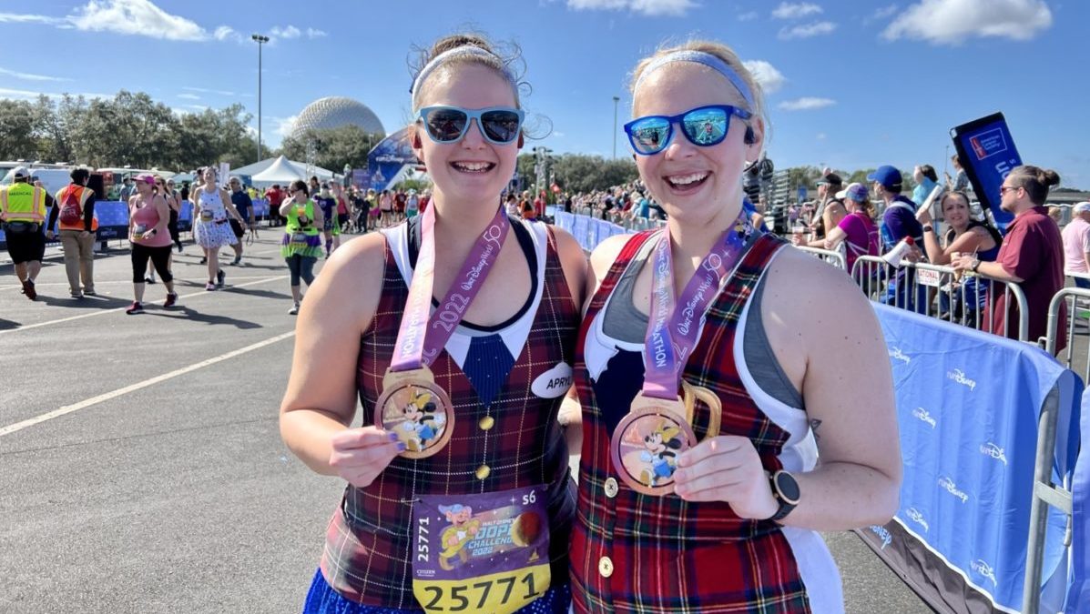 Kayla Swope and Apryl Tidd pose with their medals at Disney World Marathon weekend 2022.