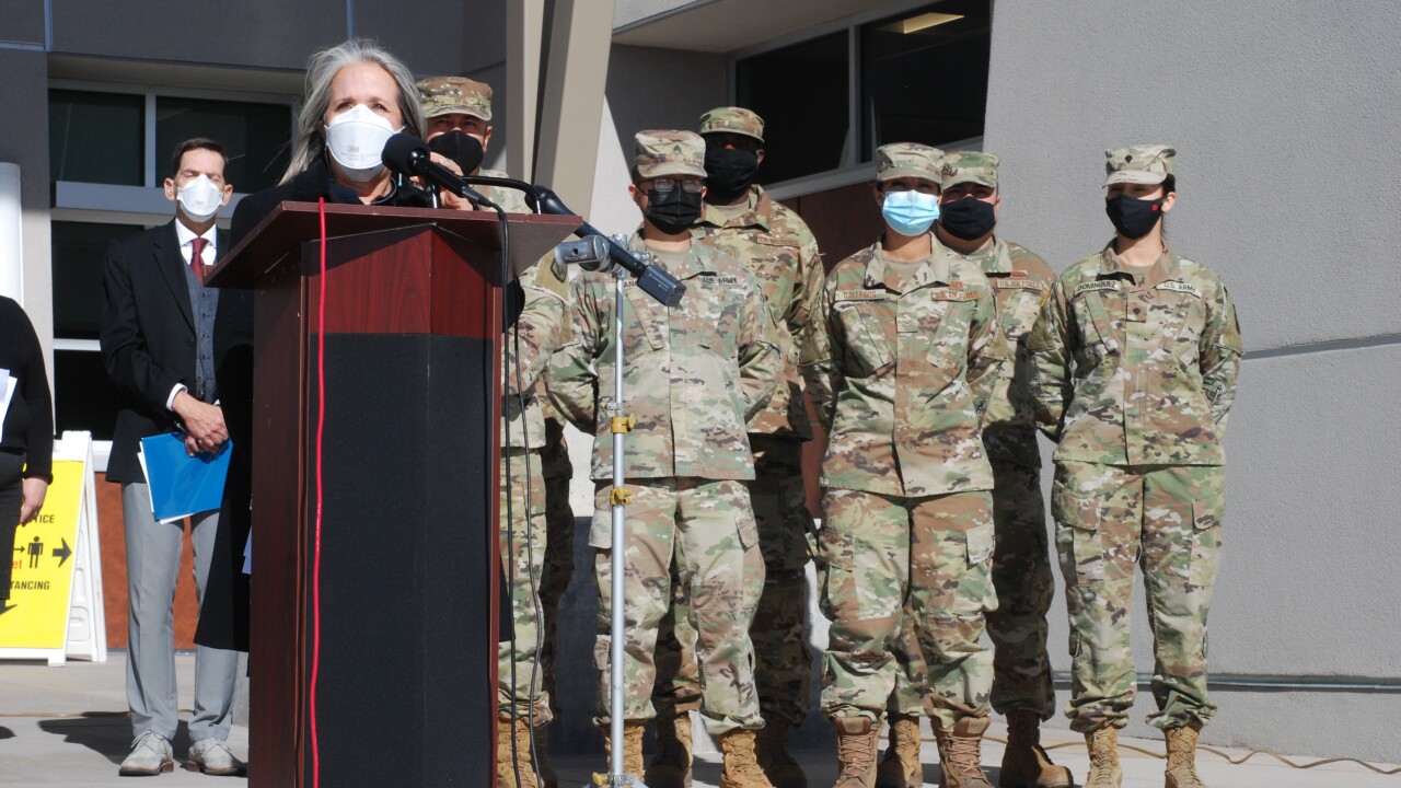 New Mexico Gov. Michelle Lujan Grisham with National Guard members