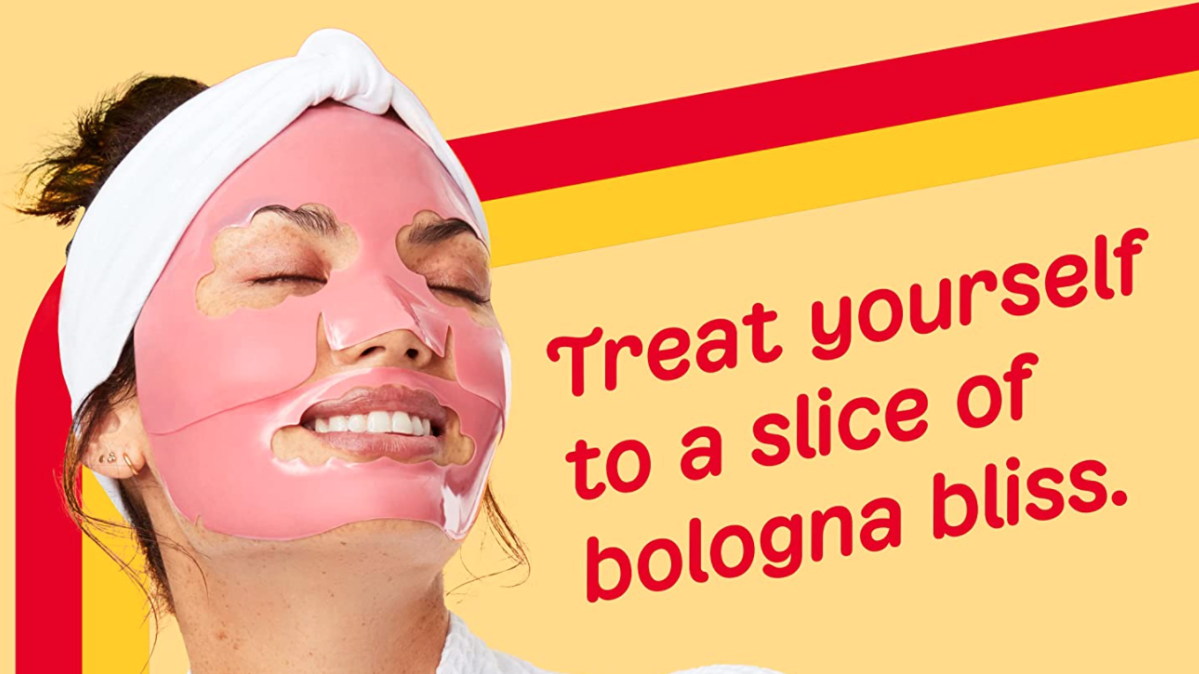 A beauty mask made to look like Oscar Mayer bologna is worn by a woman.