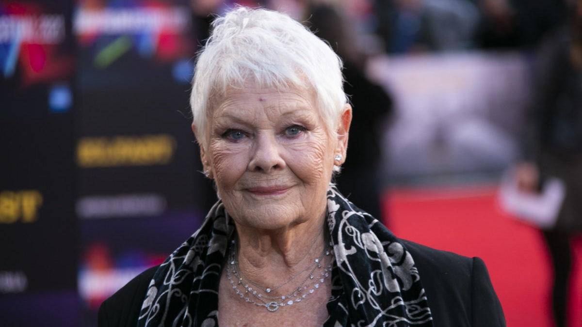 Dame Judi Dench poses for photographers in 2021.