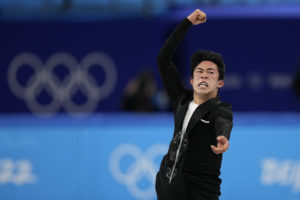 Figure skater Nathan Chen celebrates at Beijing Olympics