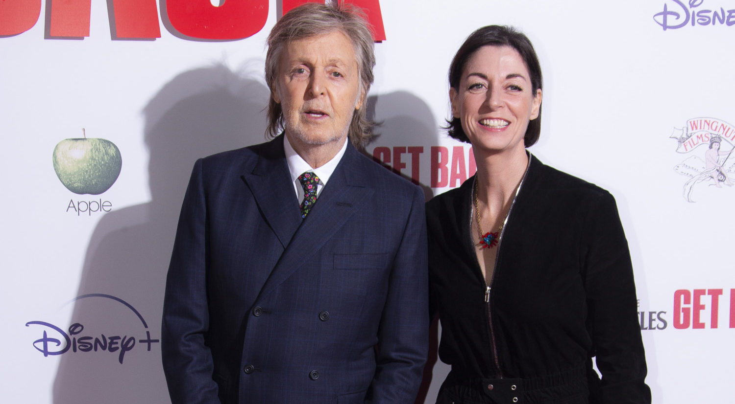 Sir Paul McCartney, Mary McCartney pose at "Get Back" premiere.