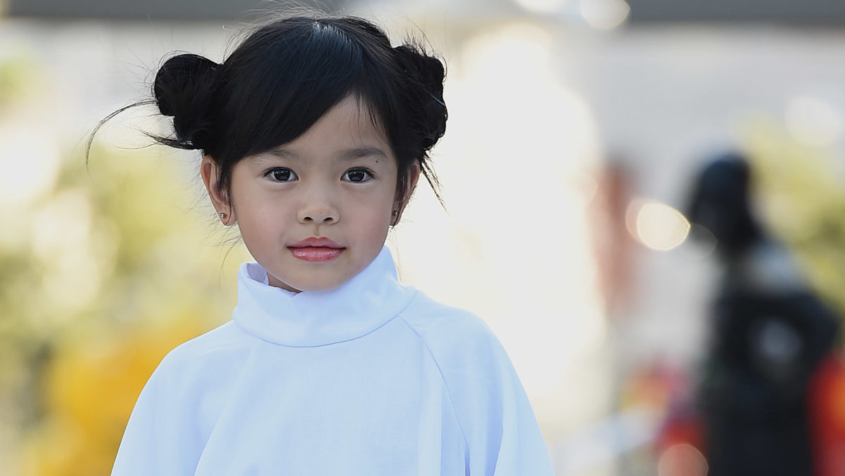 Little girl dressed in Princess Leia dress from Star Wars