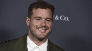 Colton Underwood smiles at event in 2021.