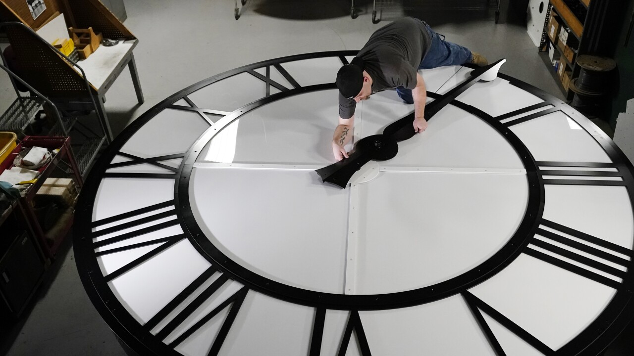 Changing time on large clock