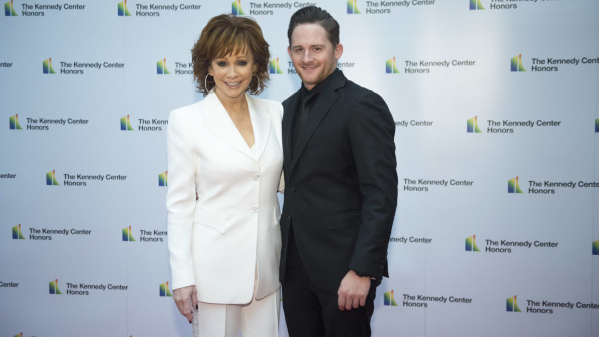 Reba McEntire and her son, Shelby Blackstock, pose together in 2018.