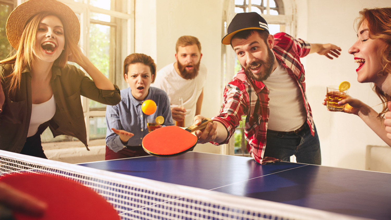 People playing table tennis