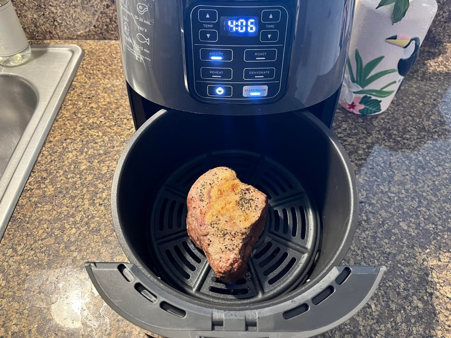 Steak mid-way through cooking in the air fryer