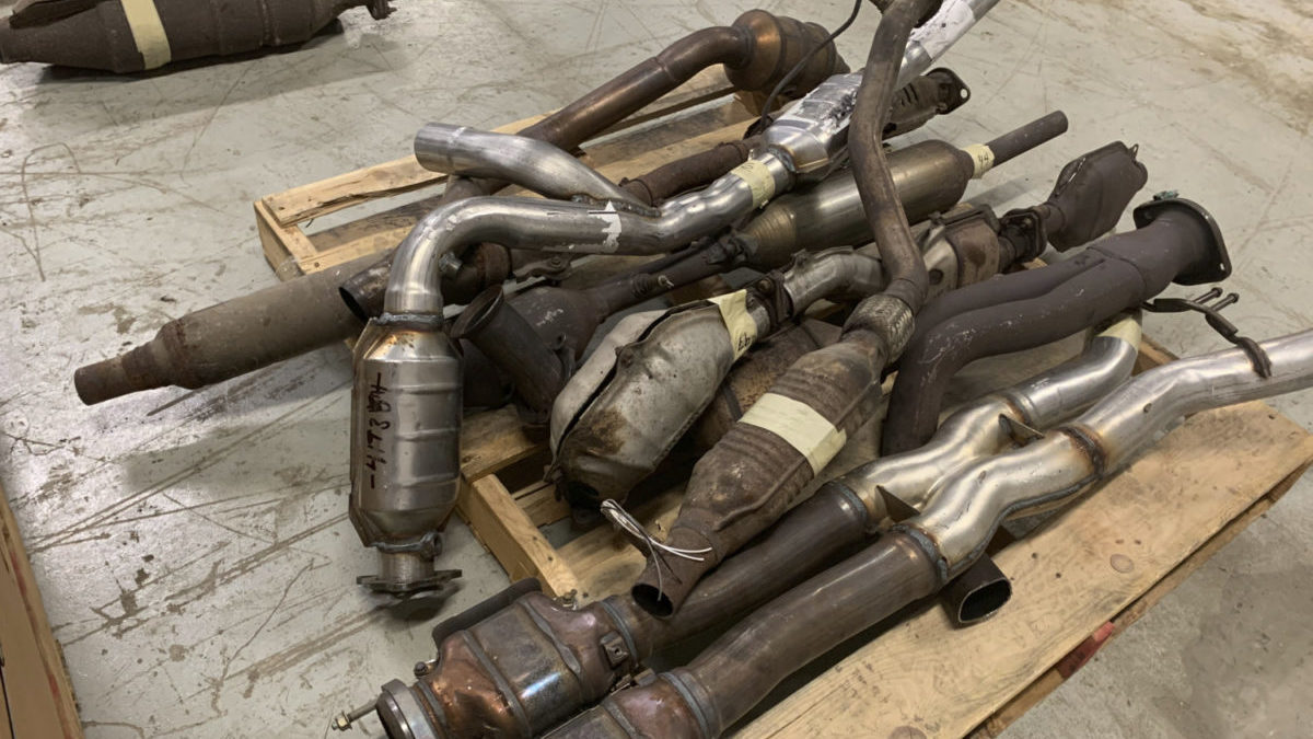 A pile of stolen catalytic converters are shown.