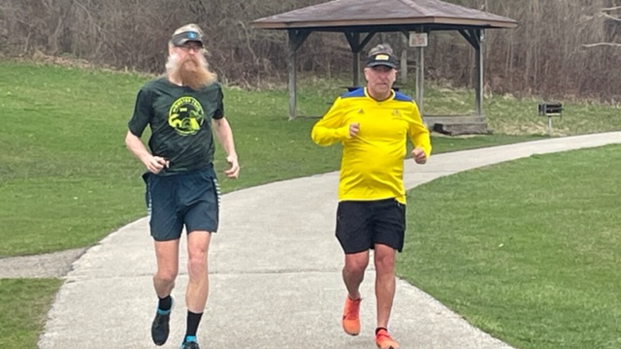 Brothers run down path training for Boston Marathon