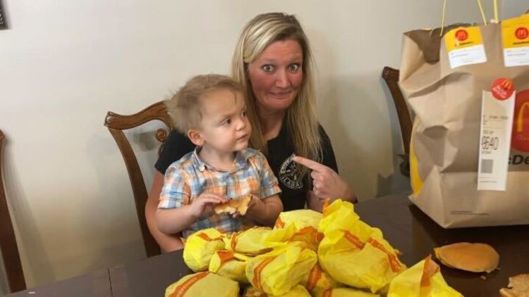Kelsey Golden and son Barrett, who ordered 31 cheeseburgers