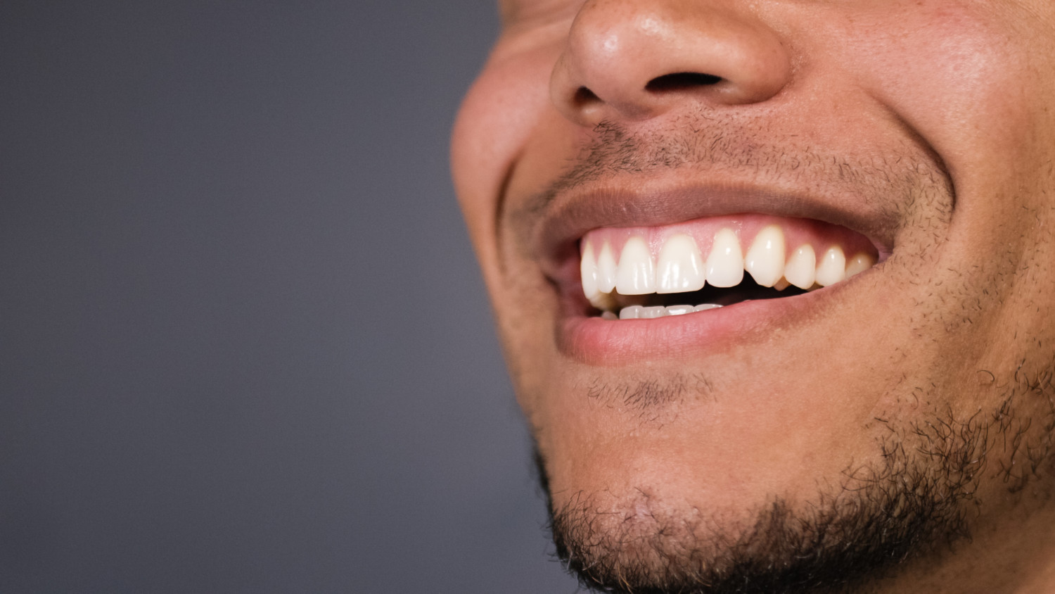 Healthy teeth of a male as he smiles