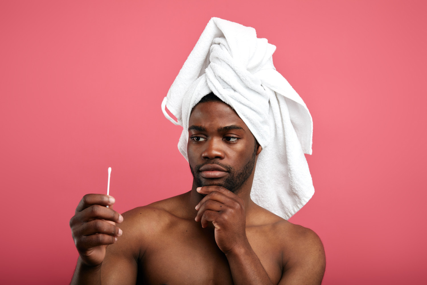 Man questions whether to use Q-tip