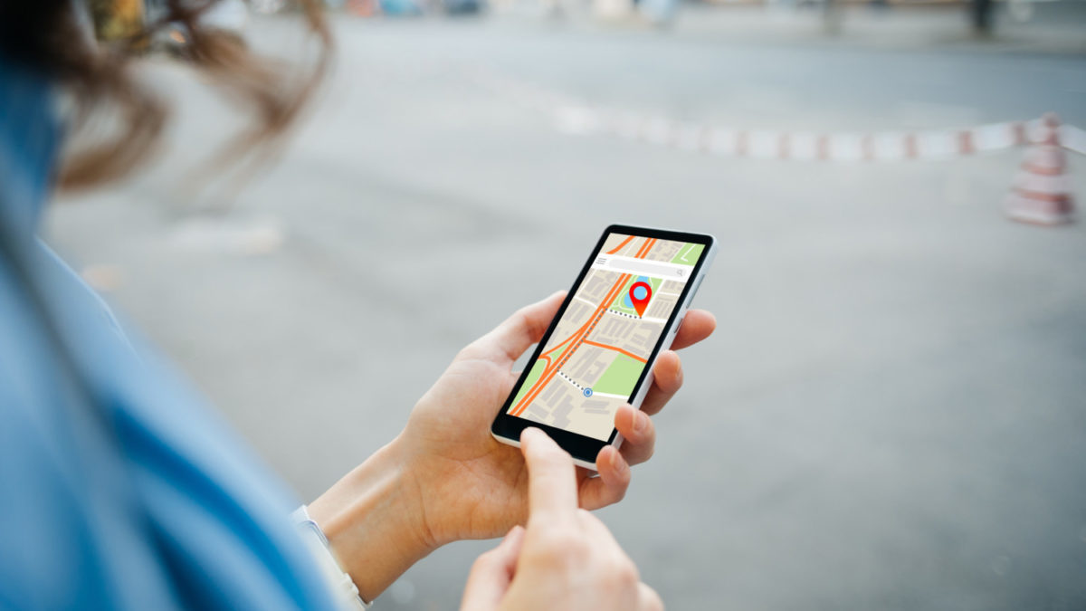 Woman uses GPS app to navigate