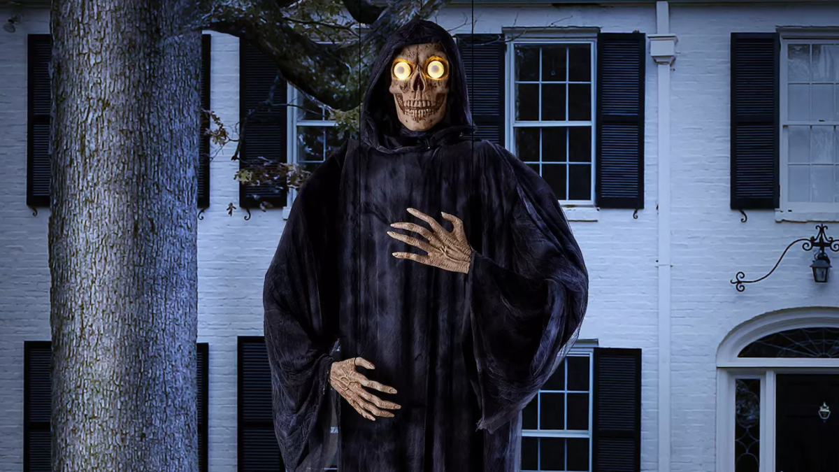 A 12-foot grim reaper figure, sold at Sam's Club, is shown.