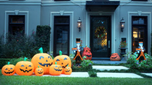 Front door and porch decorated for Halloween