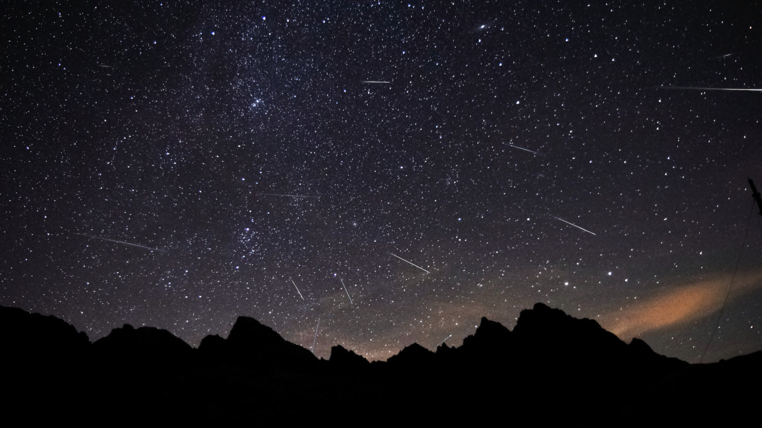 Meteor shower on night sky