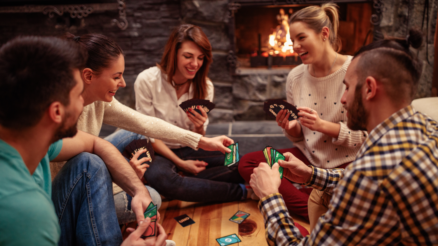 Players playing new Uno card game