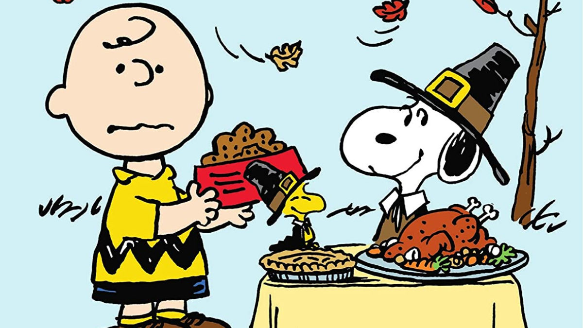 Charlie Brown, Snoopy and Woodstock share Thanksgiving dinner together.