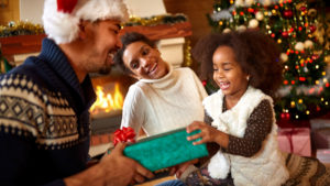 Family opens gifts Christmas morning