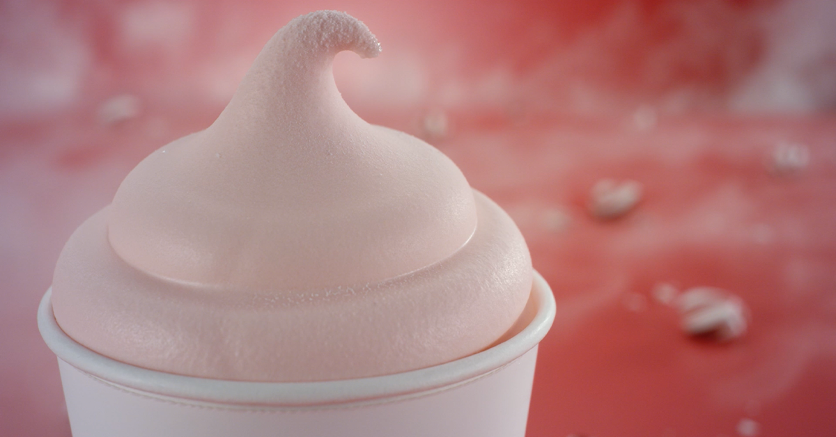 Closeup of Wendy's Peppermint Frosty on pink background