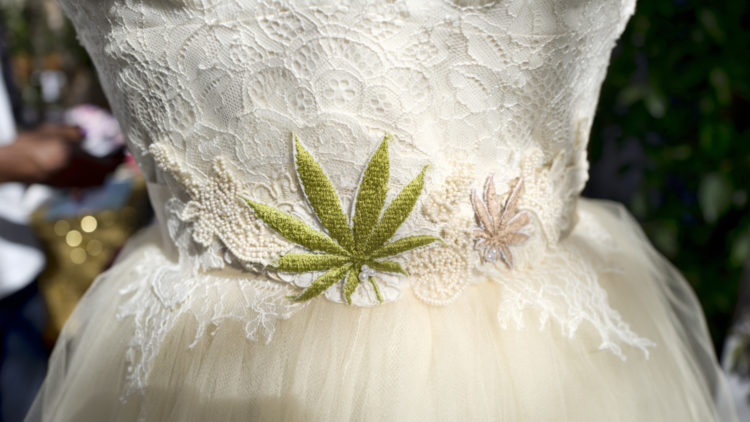 Wedding dress with pot leaf at Cannabis Wedding Expo