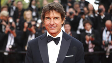 Tom Cruise on a red carpet.