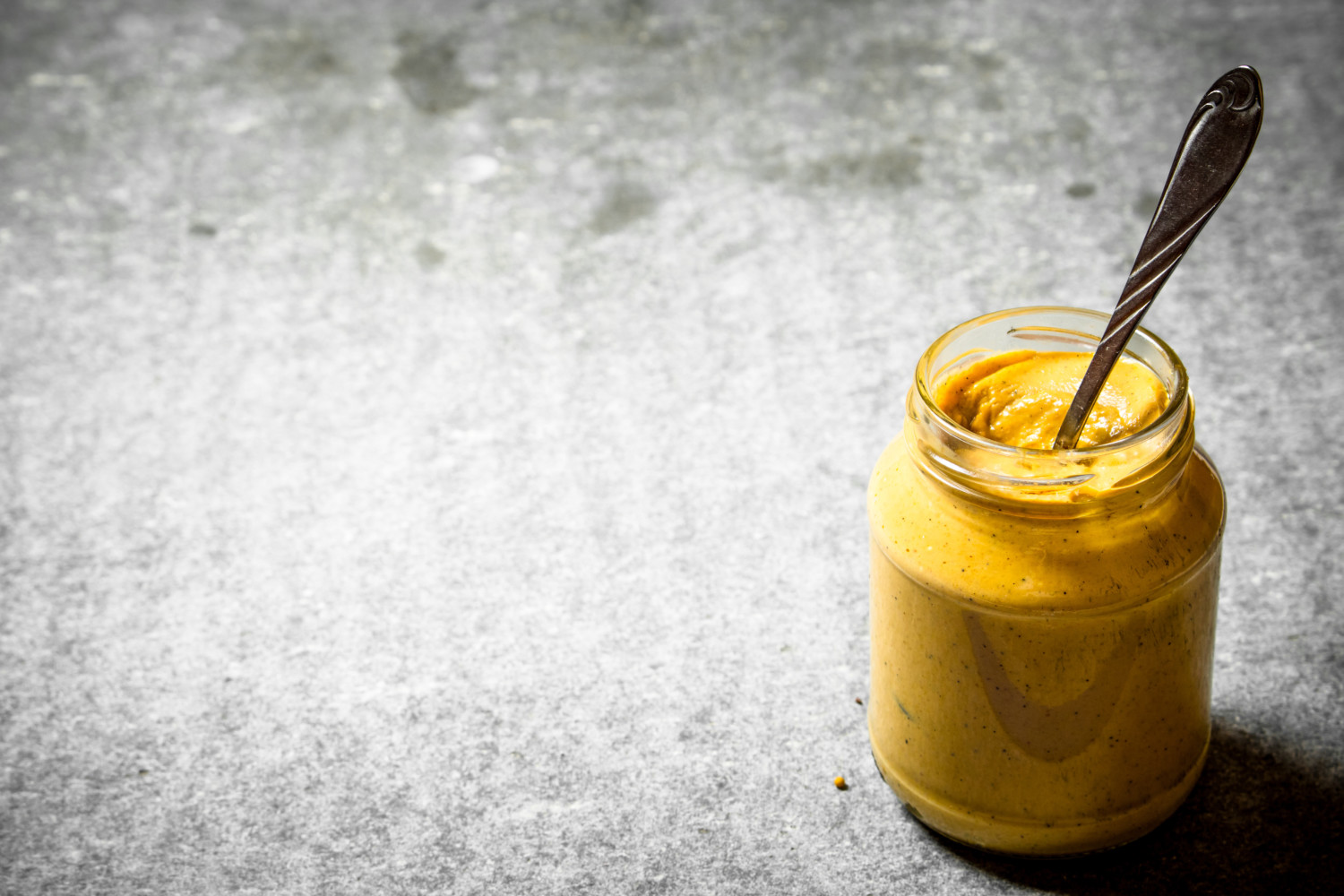 Fresh mustard in a jar