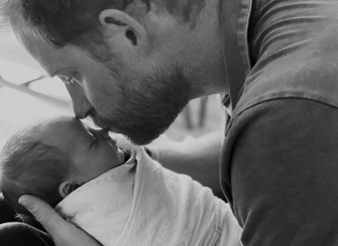 Prince Harry kisses baby Lilibet