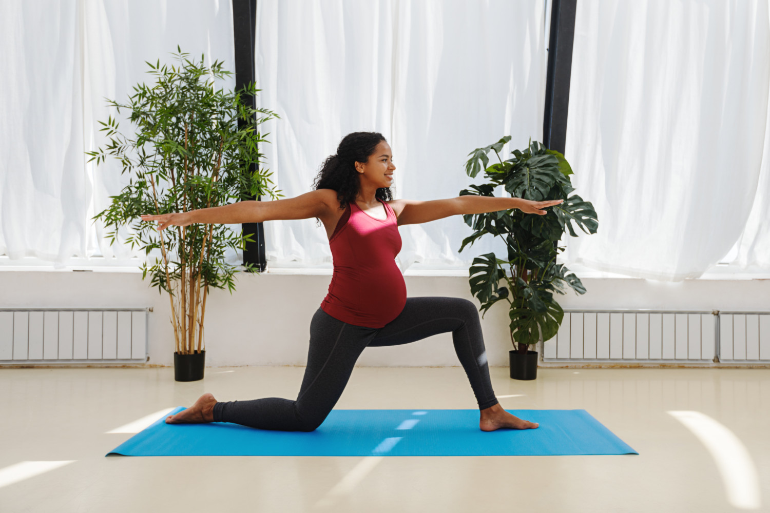Pregnant woman does yoga