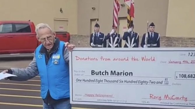 Butch Marion receives check