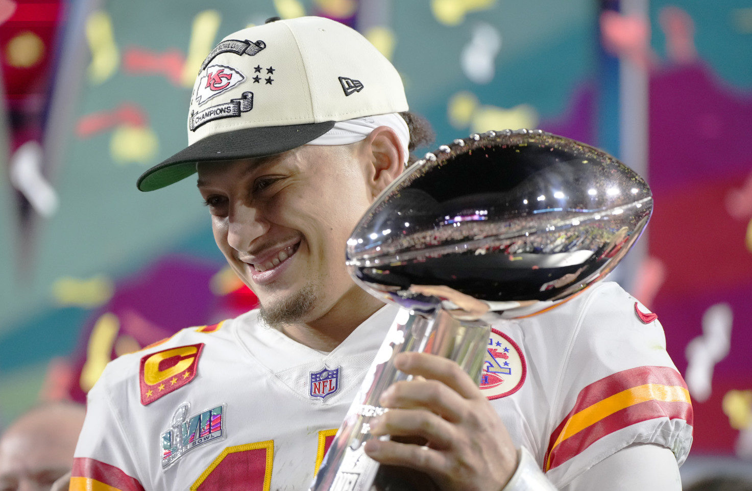 Kansas City Chiefs quarterback Patrick Mahomes (15) holds the trophy after their win against the Philadelphia Eagles in the NFL Super Bowl 57 football game.
