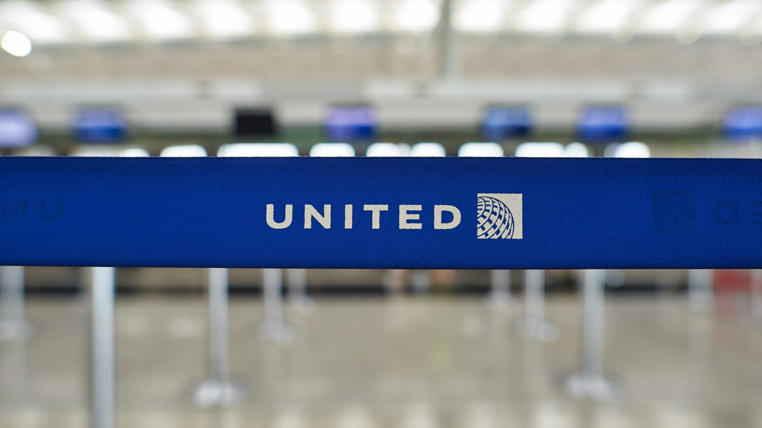 United Airlines logo in front of desks