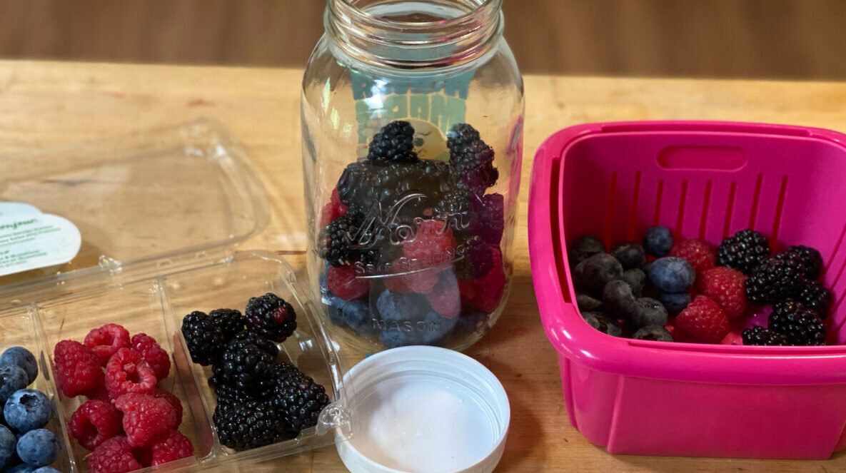 Berries stored in mason jar, original container