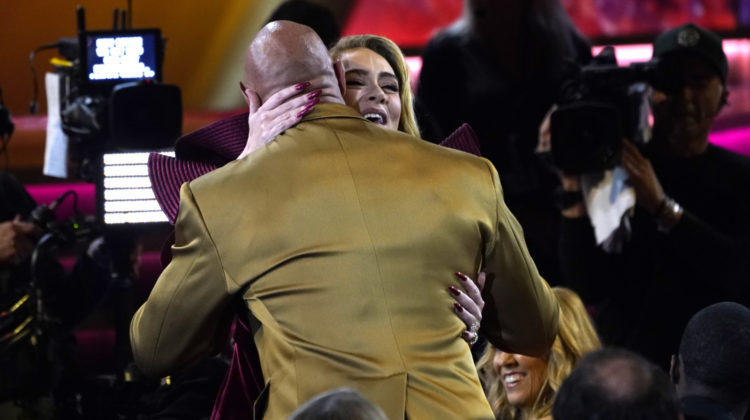 Adele hugs Dwayne Johnson