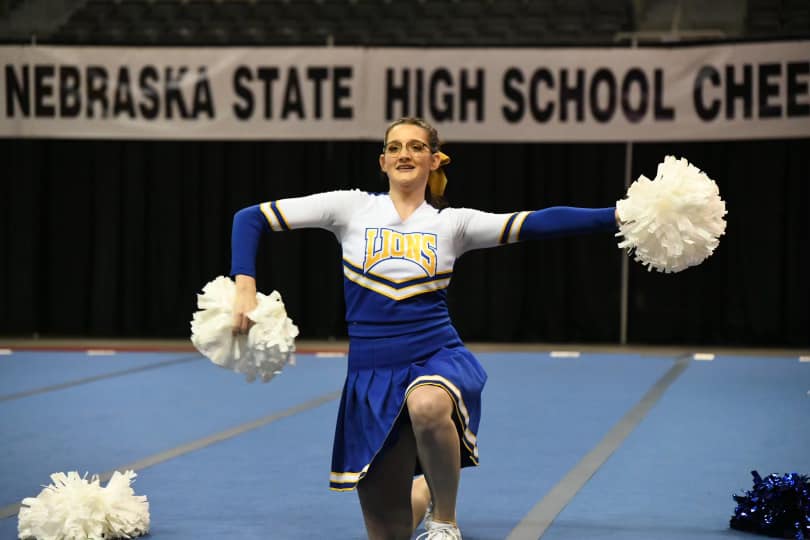 Cheerleader Katrina Kohel performs at Nebraska state championships