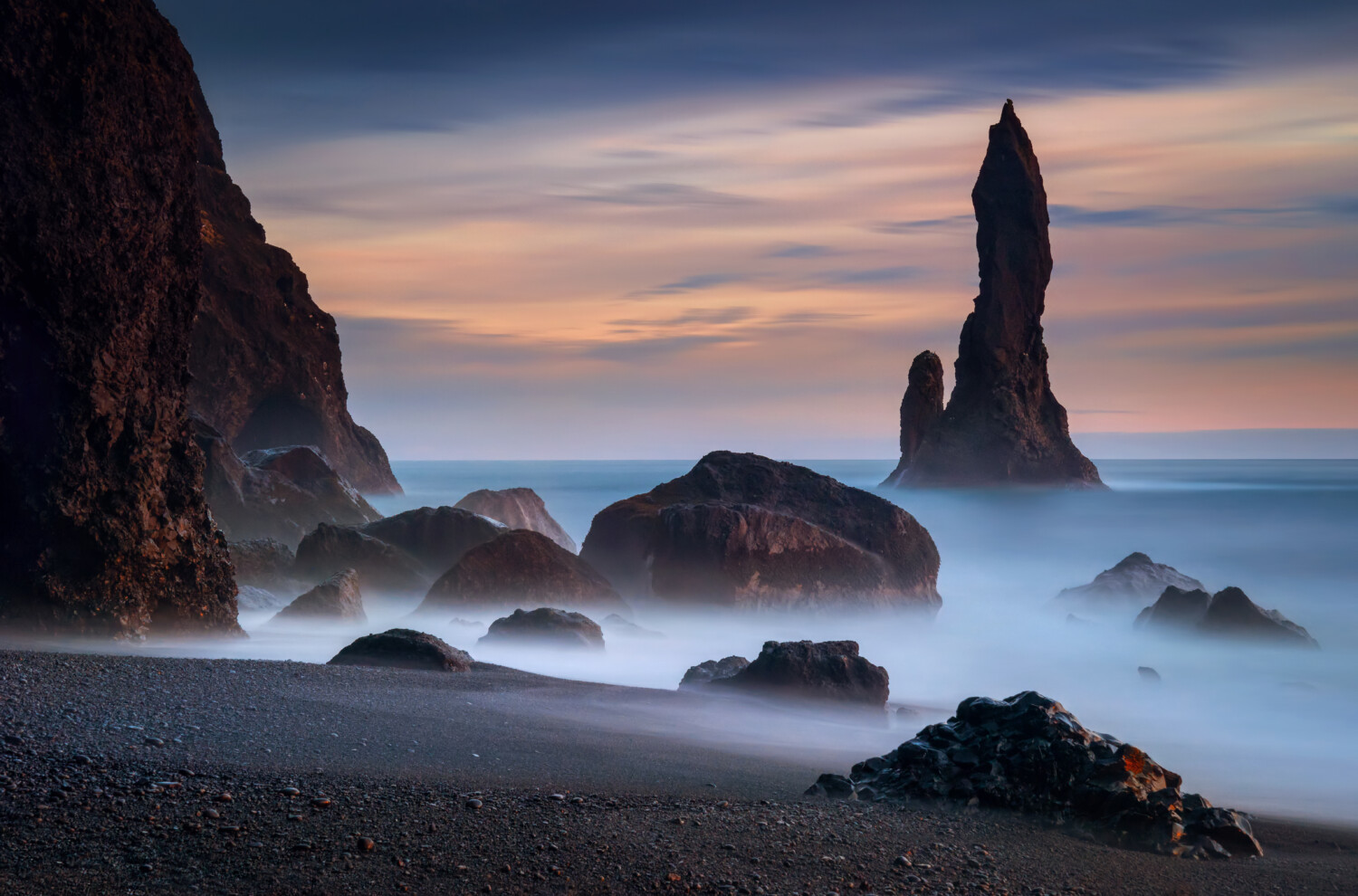 Reynisdrangar rocks on the coastline of Reynisfjara Beach, Iceland