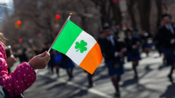 waving Irish flag at parade