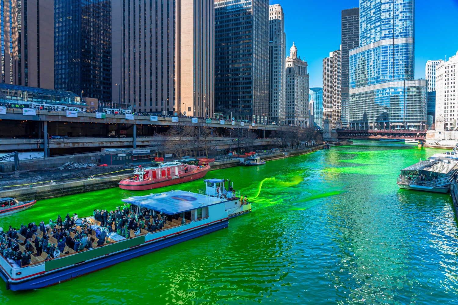 Chicago building and cityscape on Saint Patrick's day around Chicago river walk with green color dyeing river in Chicago 