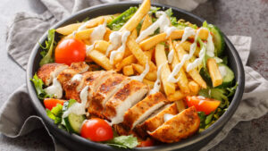 Pittsburgh salad topped with fries
