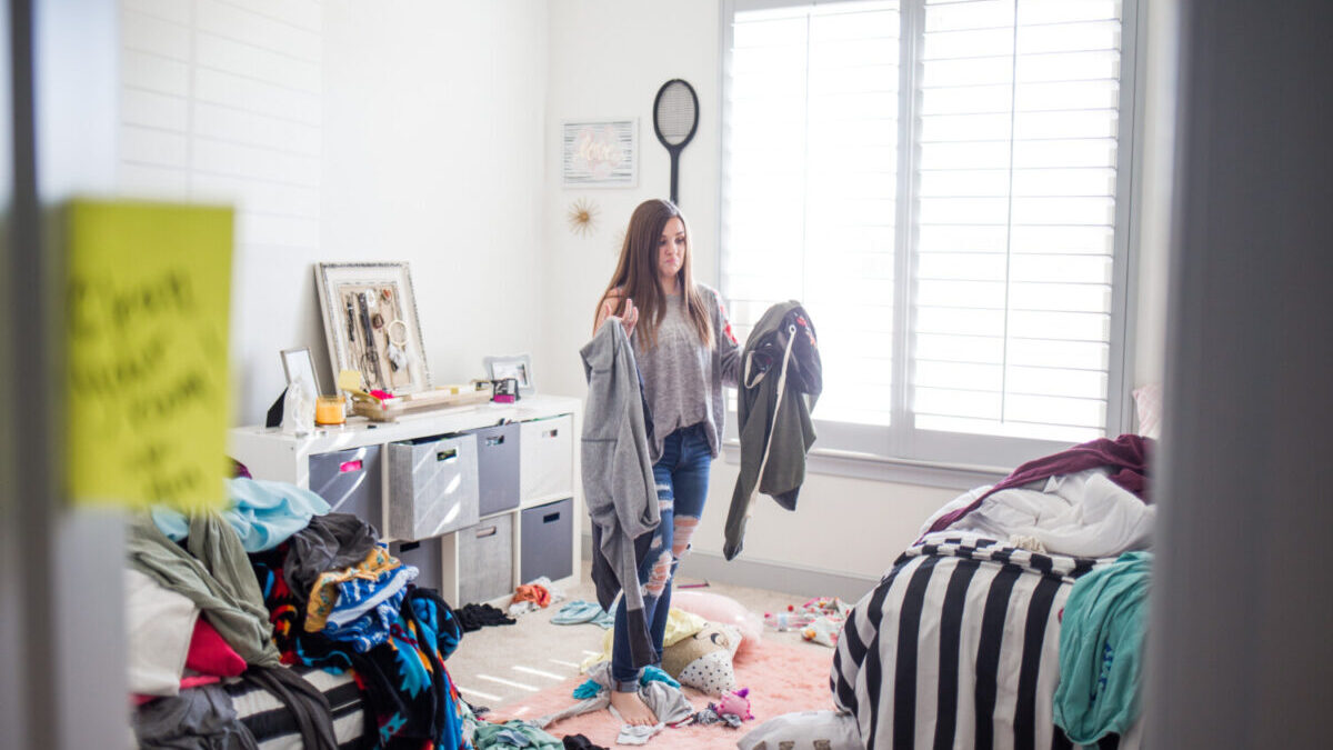 Teenage girl in messy room