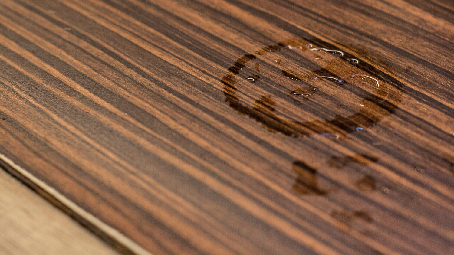 Water mark leaving stain on wood furniture