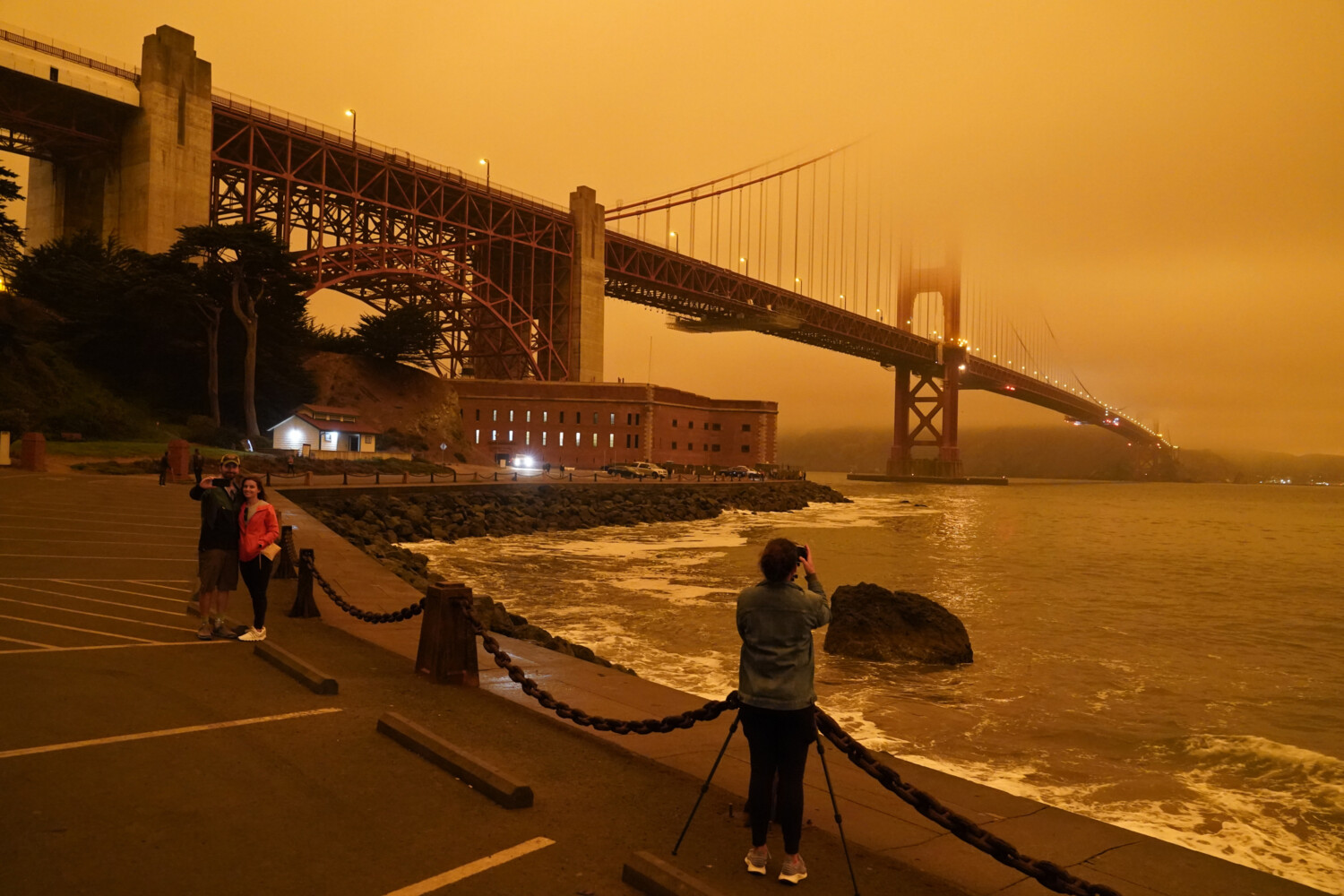Wildfire smoke creates orange haze on Golden Gate Bridge