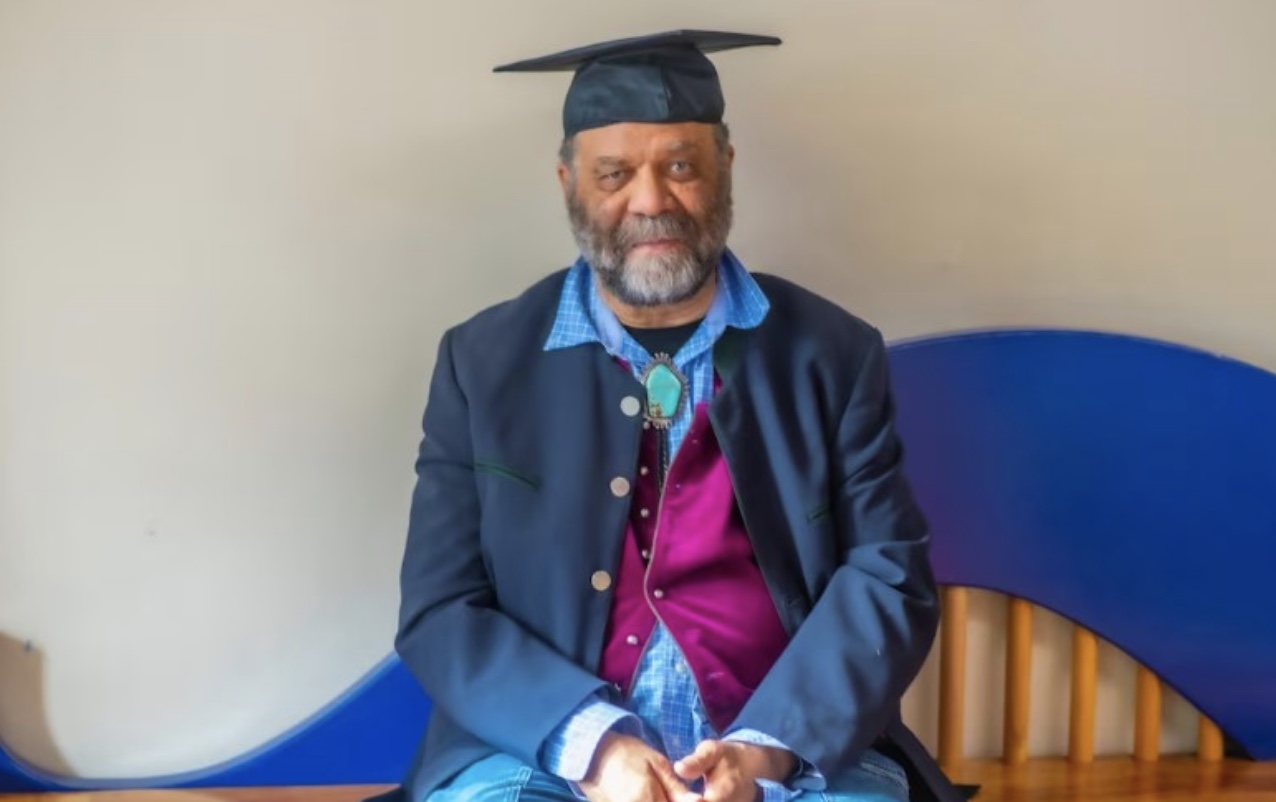 Blues musician Otis Taylor in cap and gown