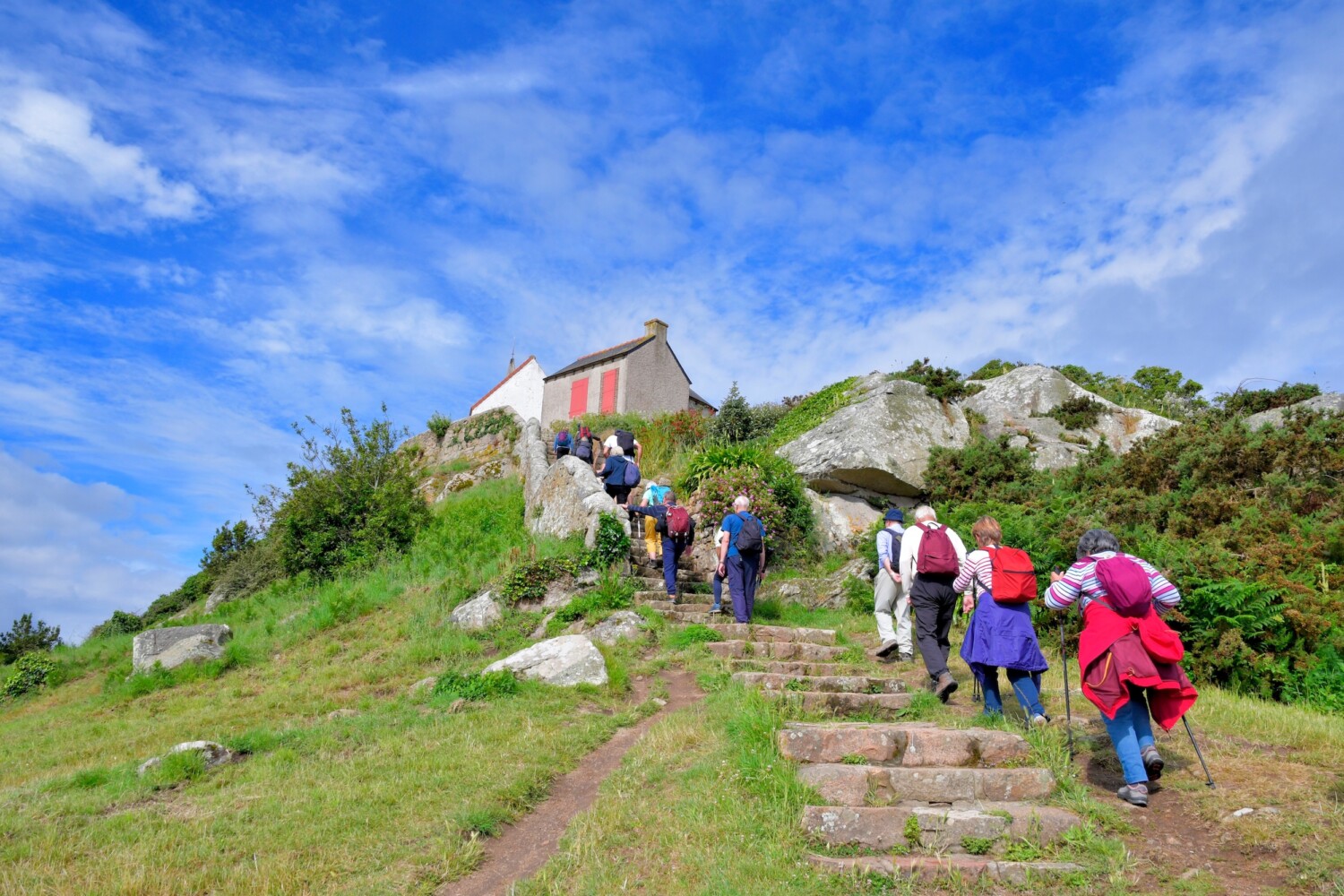 Hikers on Brehat island in Brittany, France