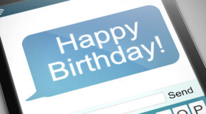 'Happy Birthday' appears on phone screen