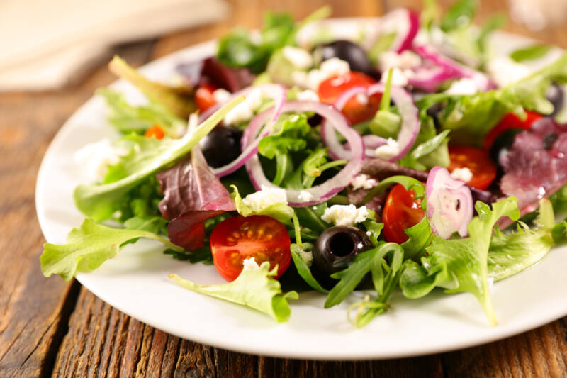 Salad with red onions, tomatoes and olives