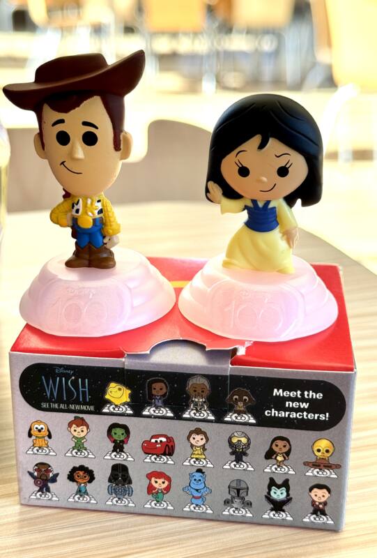 Woody and Mulan Happy Meal toys