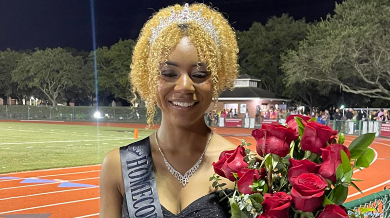 Amber Wilsondebriano holds flowers after being crowned homecoming queen