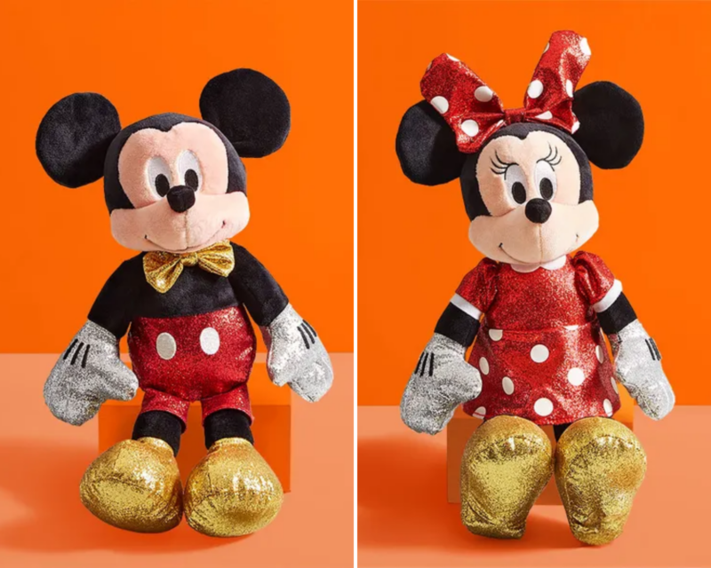sparkly mickey mouse plush and sparkly minnie mouse plush next to each other on orange background